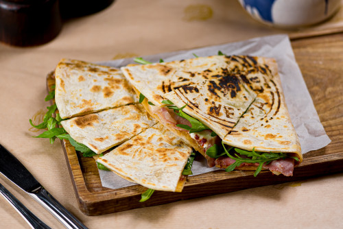 Piadina with Odessa goat cheese and crispy spinach
